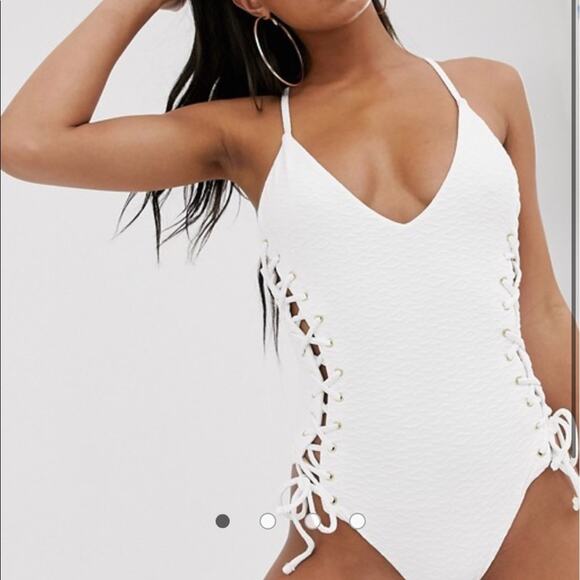 ASOS DESIGN textured lace up swimsuit with… - Picture 6 of 6